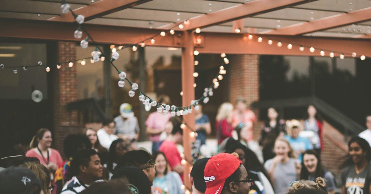 laughing people in party